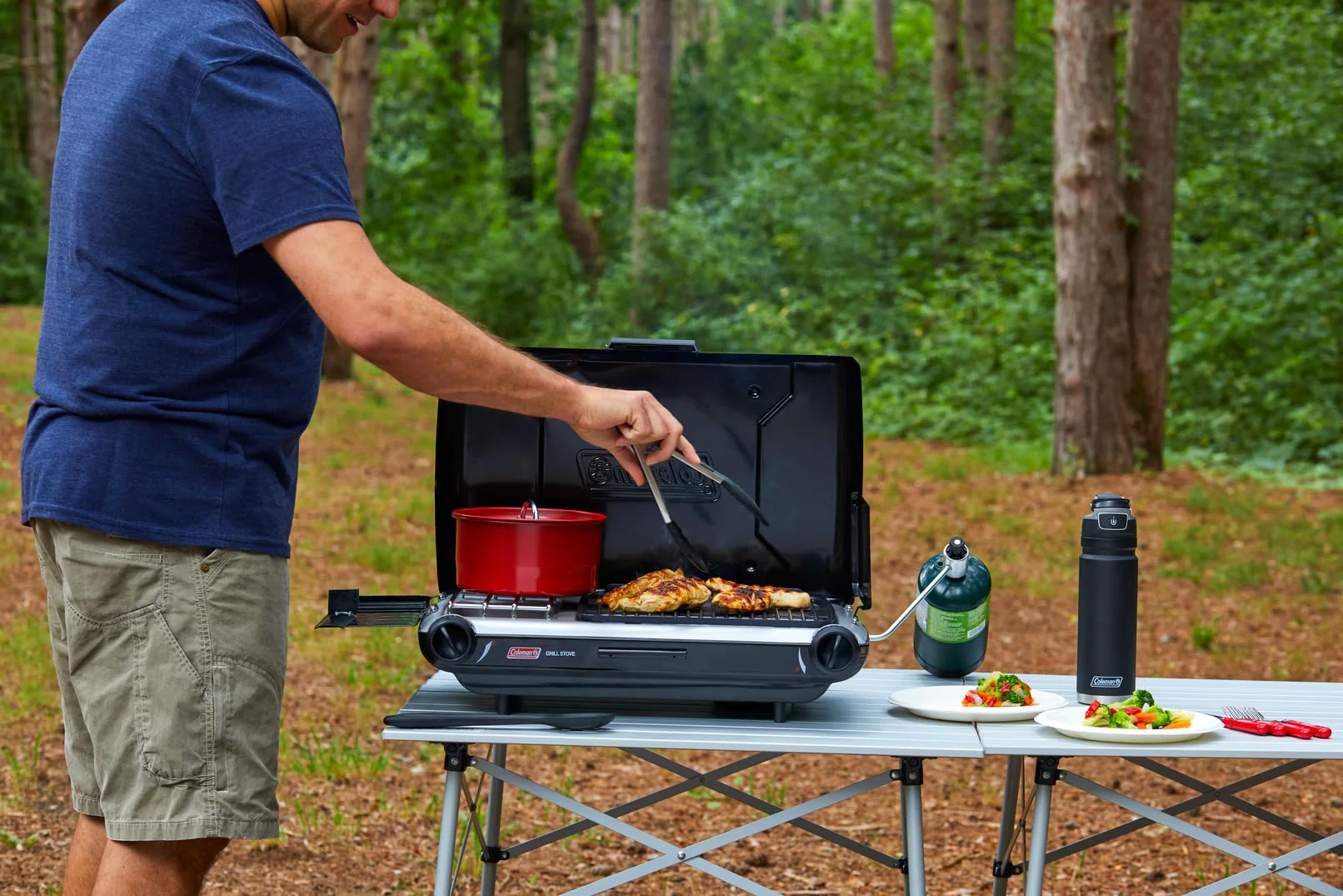Coleman 2-in-1 Tabletop Camping Grill & Stove, 20,000 BTUs, 4 Burners, 130 sq. in. Grilling Area